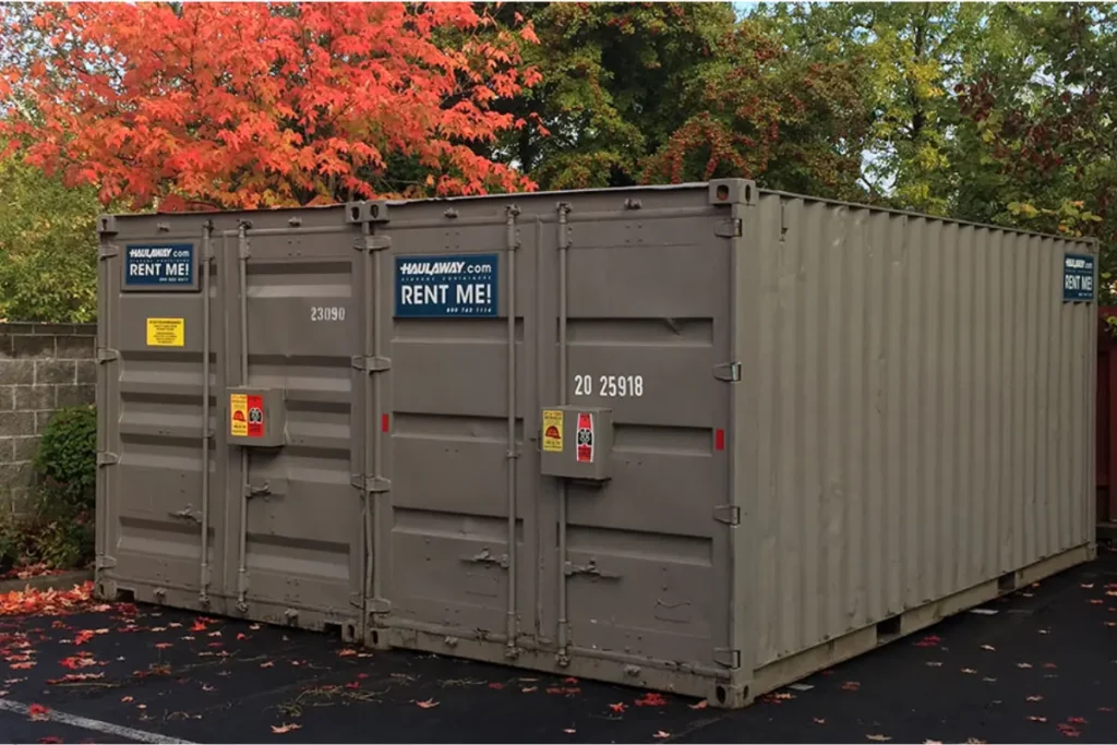 Rent a shipping container for secure and reliable storage, shown here with rental signage in a parking lot