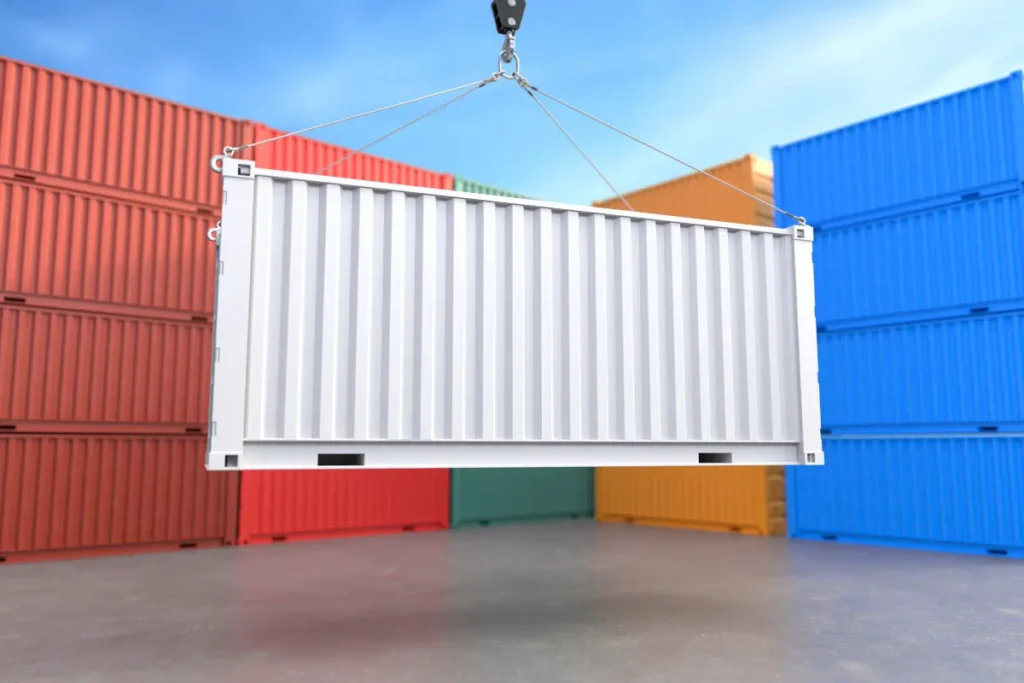 Mobile storage units displayed as a white shipping container suspended by a crane at a storage facility